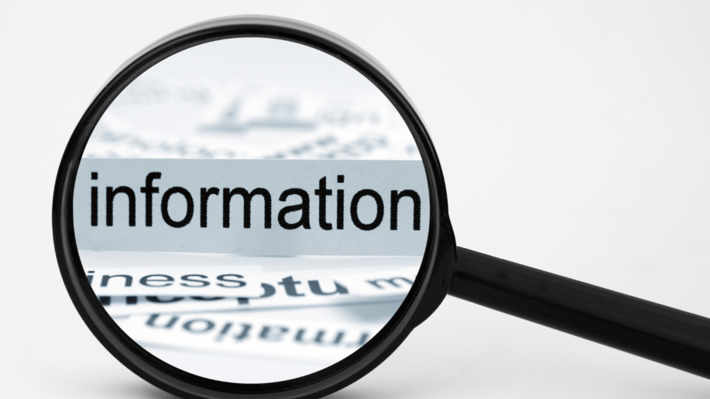 虫眼鏡で拡大されたinformationの文字